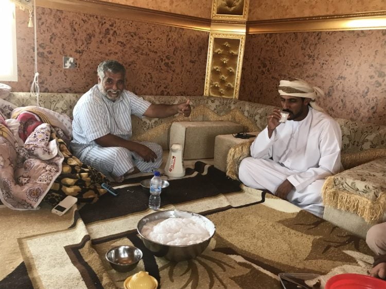 Bedouin men drinking coffee.